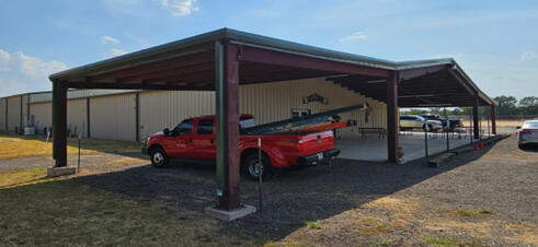 3000 sq/ft Awning and carport for a Cowboy Church. Made with 12’ sq/tb and industrial I-beams