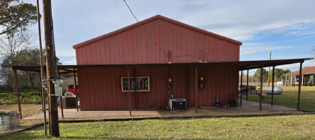 Wrap around Patio custom fit to a 60 year old Barn