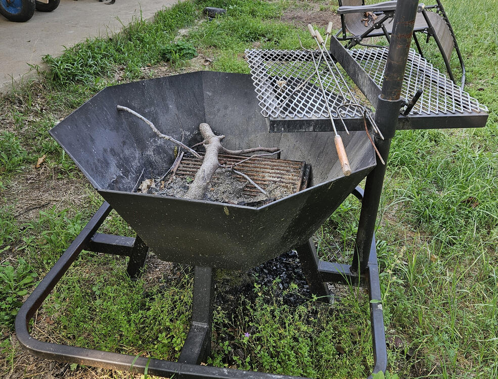 Fire pits with grill and hanging pits