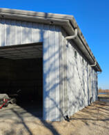 Total Reskin from Hail Damage roof and walls